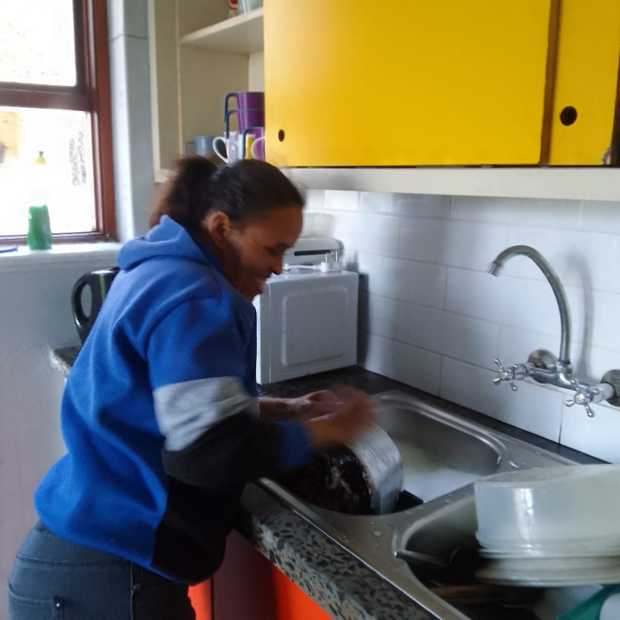 Residents washing up together